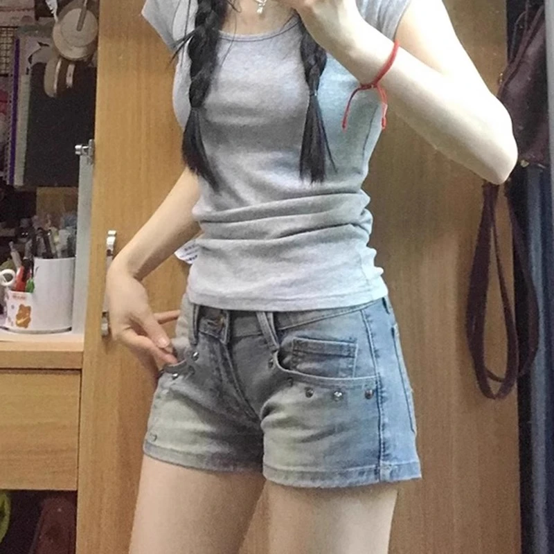 浅蓝色磨破牛仔短裤女夏新款辣妹低腰修身阔腿显瘦a字包臀热裤子