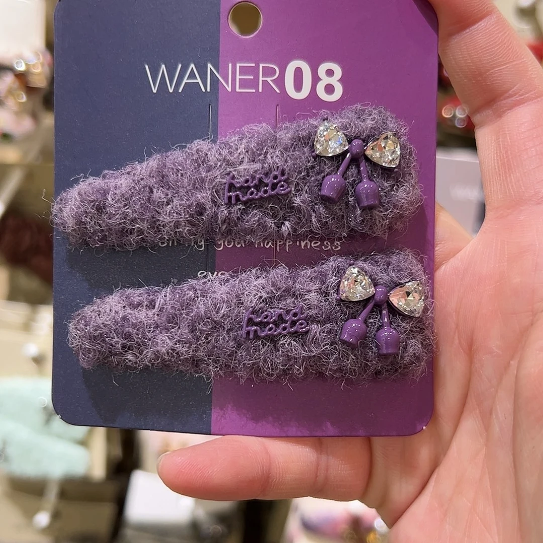 布艺非金属紫色蝴蝶结拜拜夹