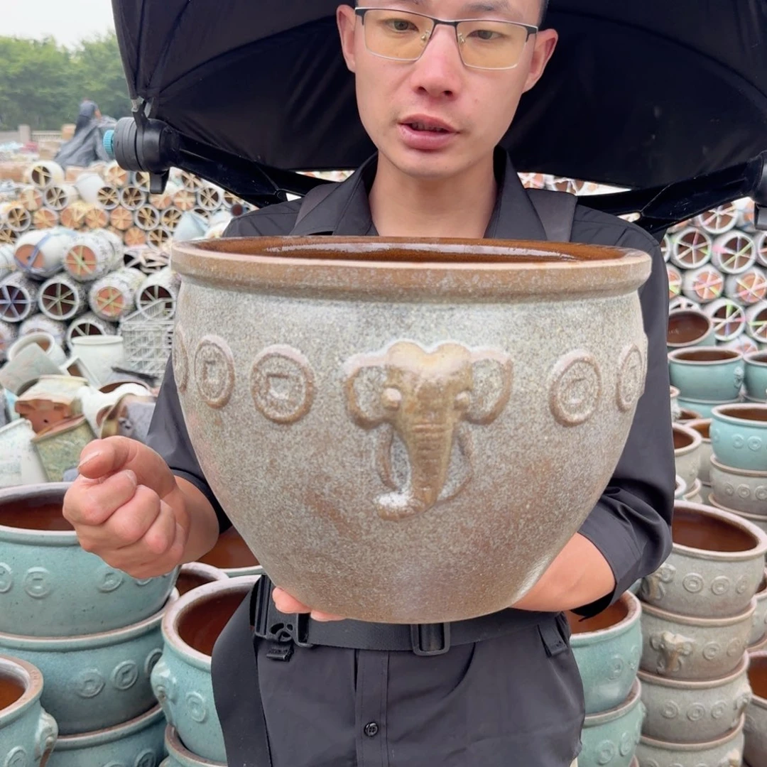 紫砂花盆灰色水缸一个大象一个