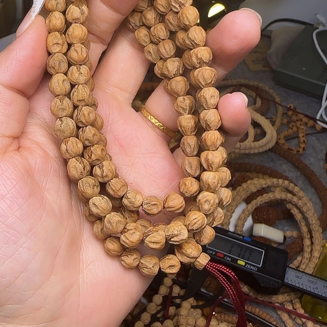 柏香籽/百香籽吊坠原桩微磨红芽口深坑鬼脸