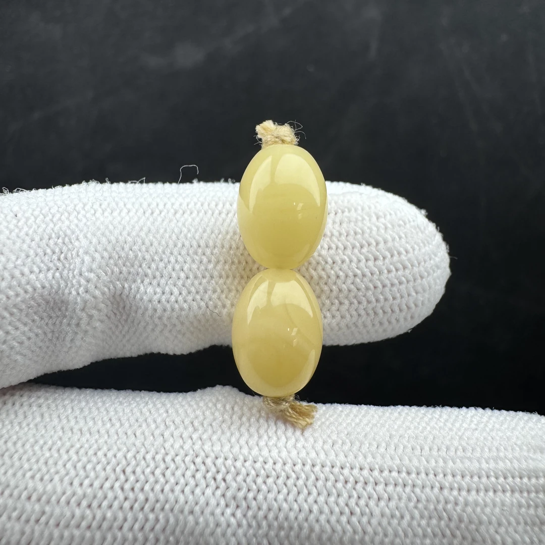 K2633天然原矿蜜蜡 对珠8.5mm支持鉴定 假一罚十