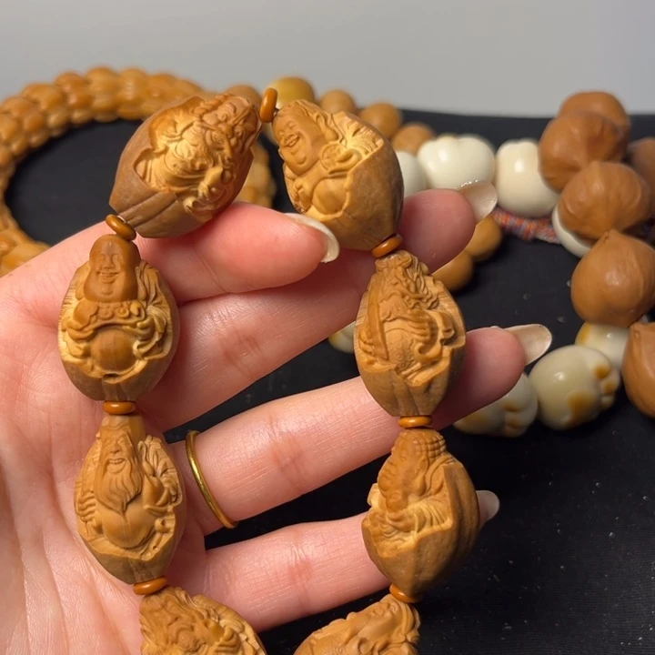 橄榄核手串包衣群仙会