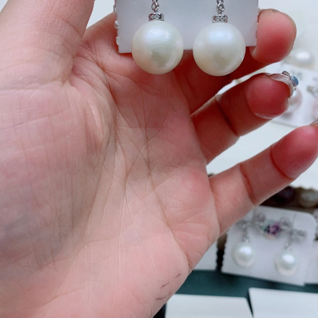 紫***钰银S925镶嵌耳饰淡水珍珠