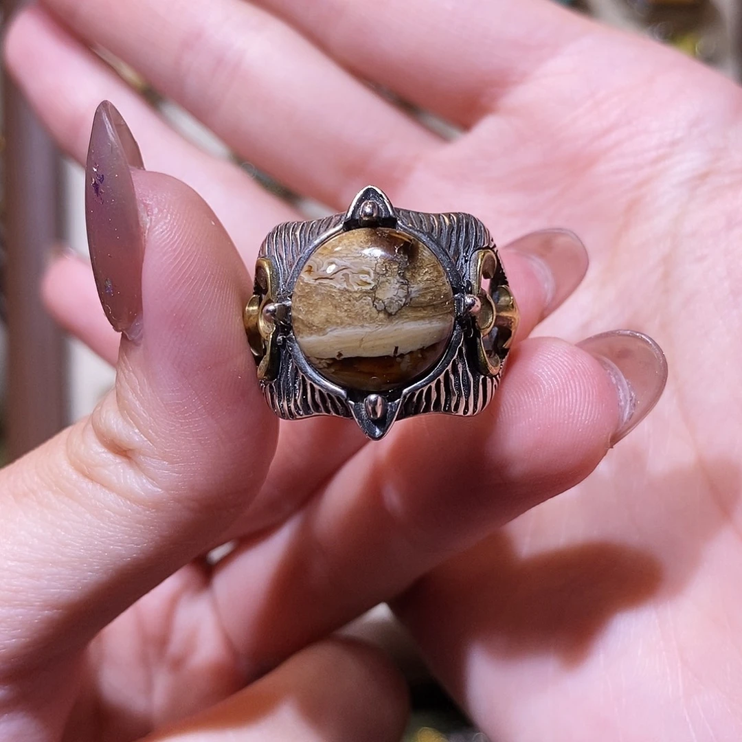 琥珀银S925镶嵌戒指郭****?