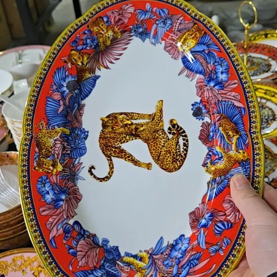 幸***乐瓷片瑕疵背面珐琅彩鱼盘一个66666