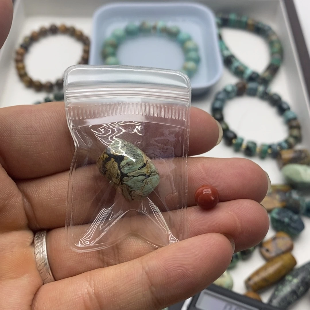 喵***吉未镶嵌南红玛瑙珠宝奇石
