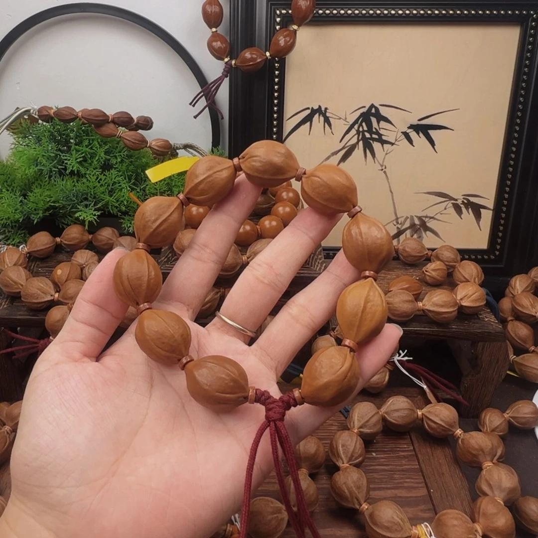 王***飞手串橄榄核19.26梅林铁核霜