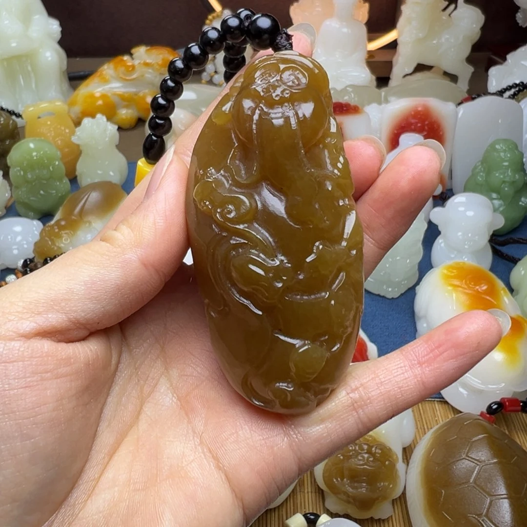 石材手工雕刻红糖财神