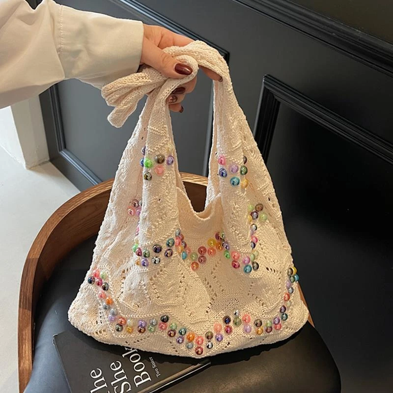 大容量针织包包女夏天2025新款休闲单肩珍珠包手工编织海边沙滩包