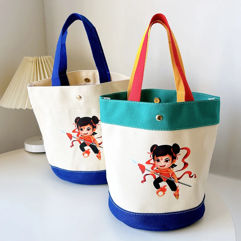 卡通手提包帆布小包时尚韩版学生便当包妈咪包水桶包帆布袋定制