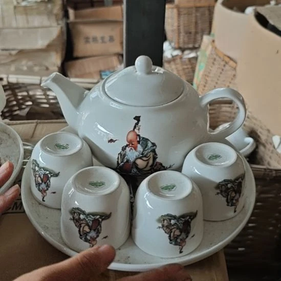 库存微瑕老寿星多孔茶壶一套