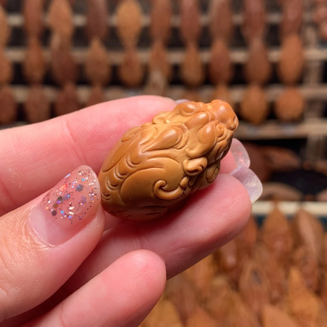把件橄榄核独角貔貅