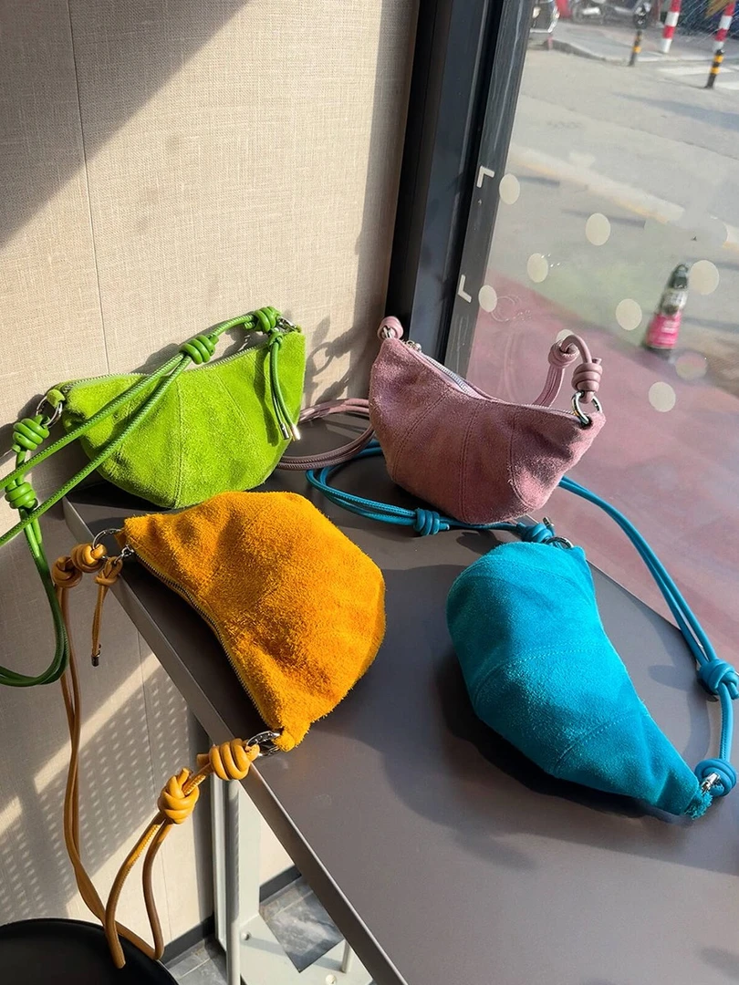 麂皮迷你牛角包女可颂包高级感真皮腋下包牛皮百搭单肩斜挎饺子包