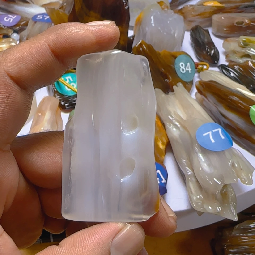 蜉***悠未镶嵌手把硅化玉