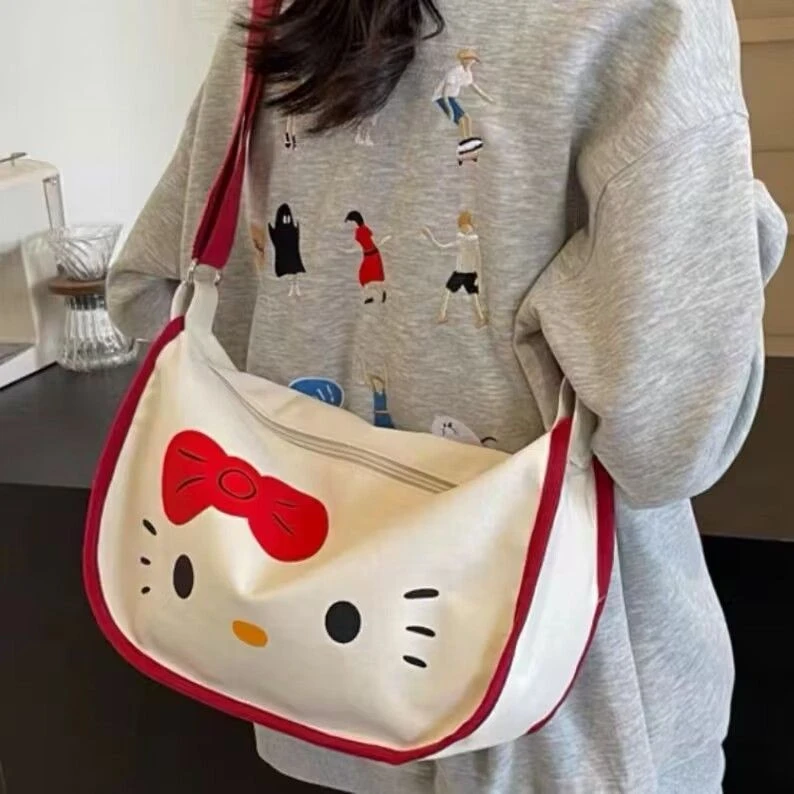 hellokitty斜挎包学生帆布包新款卡通大容量百搭单肩马鞍饺子包LW
