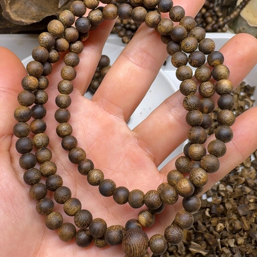 哆***乐沉香碎屑沉香奇楠沉香蓝宝石0.6珠15克