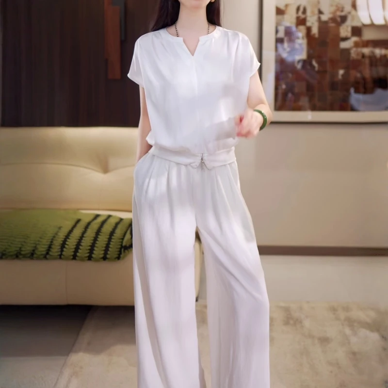 夏天穿搭一整套2025夏季新款宽松显瘦收腰无袖上衣阔脚裤两件套潮