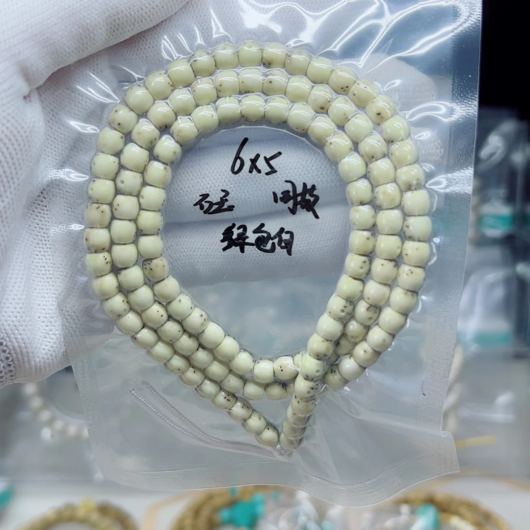 手串星月菩提石玉6*5绿包白直切半壁微氧化