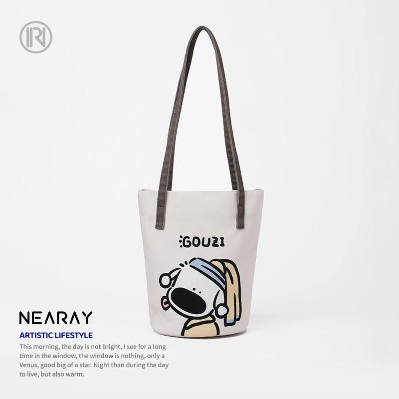 艺术鸭吃盐的鱼可爱狗子艺术家单肩水桶包日常通勤大容量帆布包女