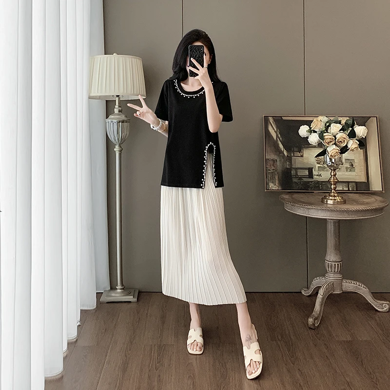 轻奢气质穿搭一整套女2025夏高级感黑色短袖上衣白色半身裙两件套