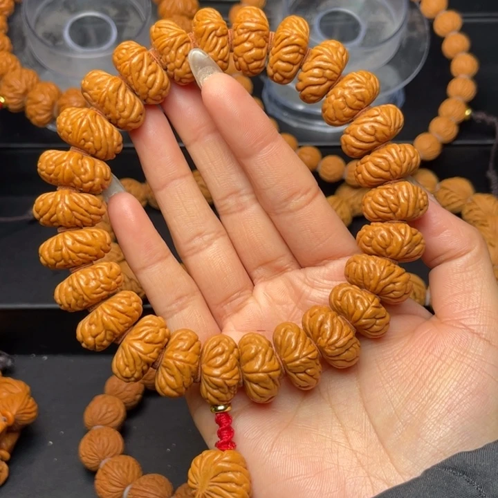 桃核手串蚊*19尺寸祥云飞碟（36号链接）