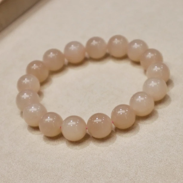 【桃夭】天然和田玉野牛沟珍藏级浓藕猫眼12m手串