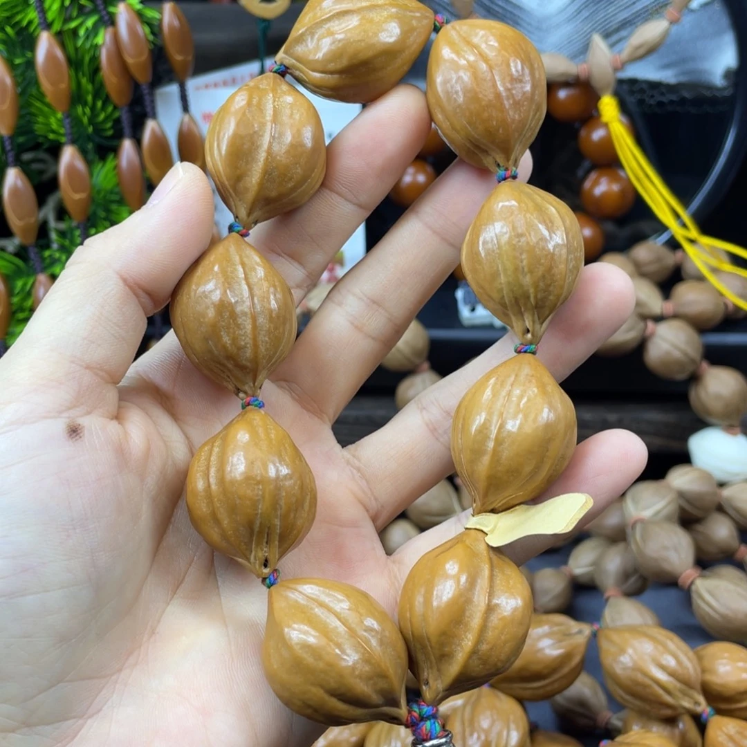 暖***阳吊坠橄榄核005铁头核