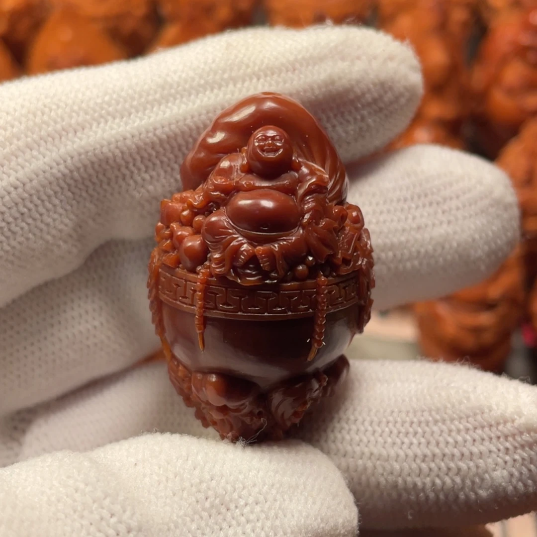 逍***在橄榄核手串/手链聚宝弥勒