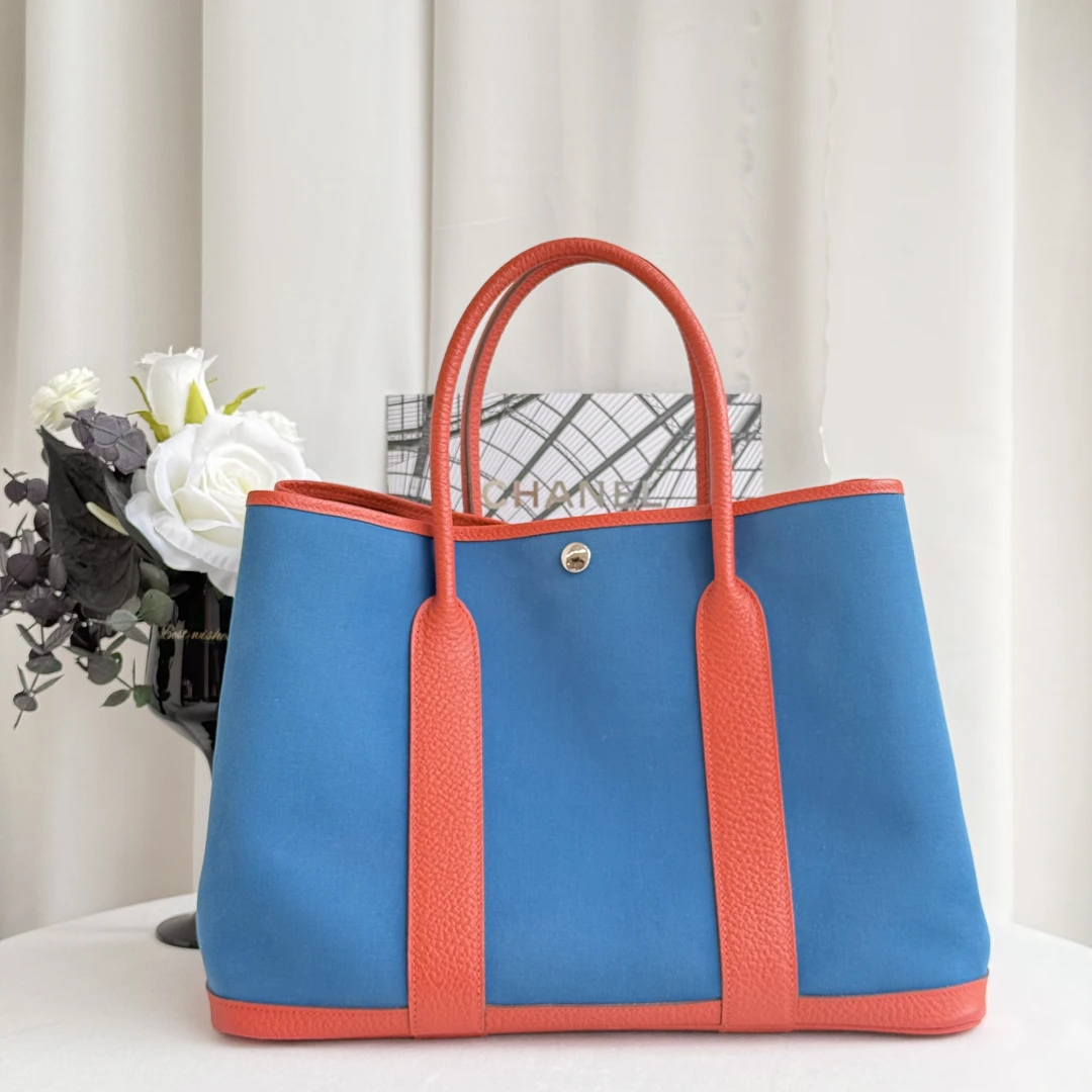95新 Hermes/爱马仕 爱马仕花园36 南瓜色拼皇家蓝帆布 银扣A刻