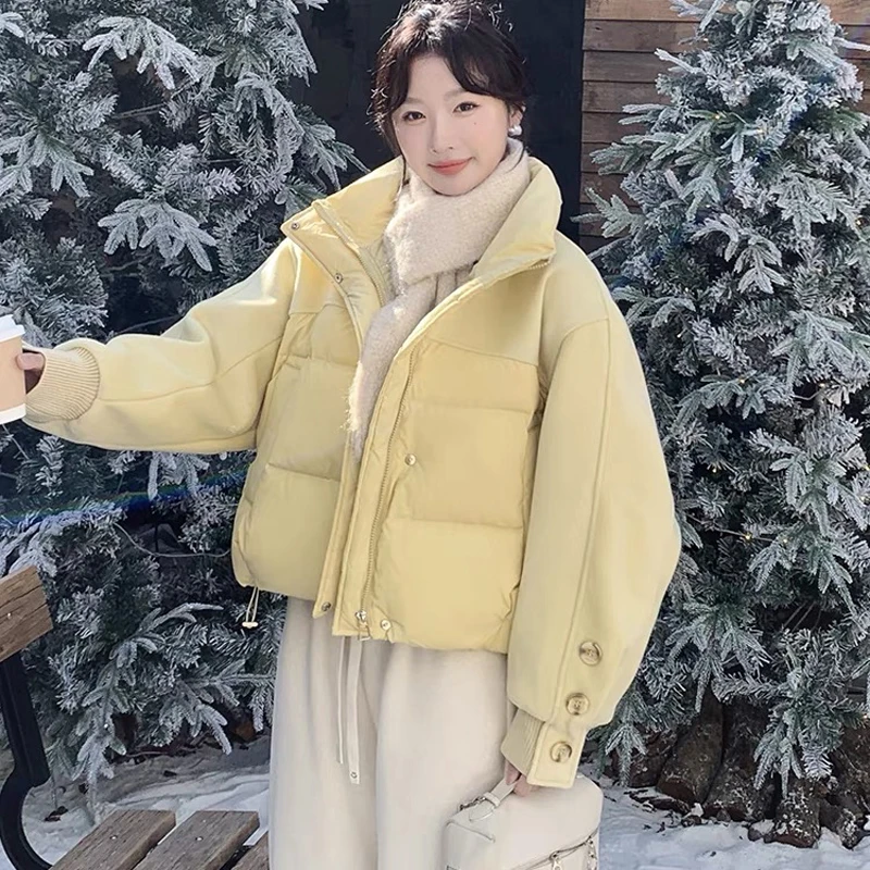 奶黄色毛呢拼接女冬季好看立领面包服加厚款时尚休闲百搭外套 773