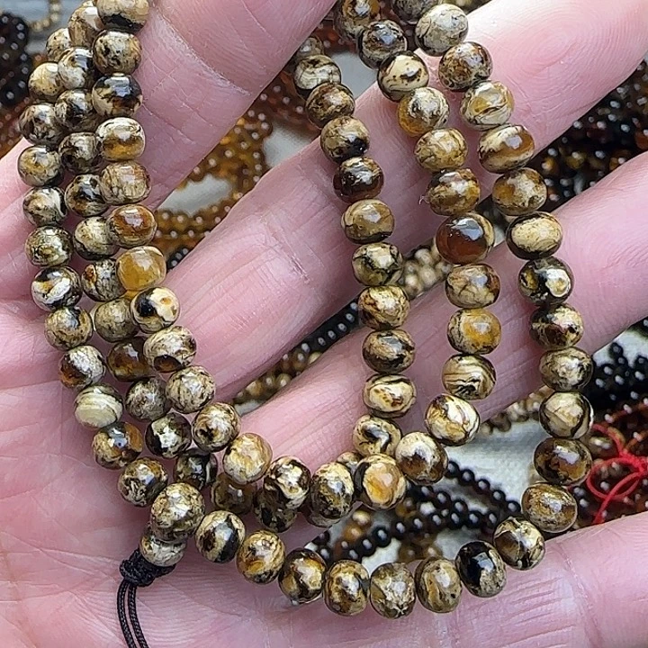 豆***豆琥珀未镶嵌颈饰抚顺花珀6mm108