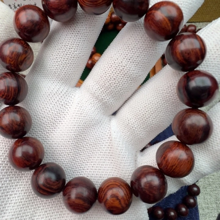 木夜**人海南红降1.2圆珠满纹理