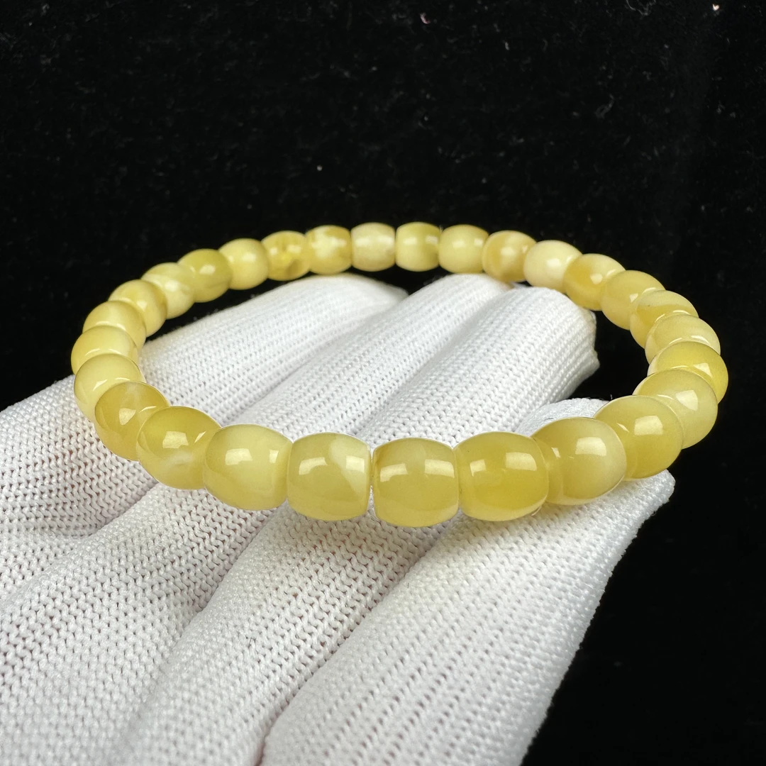 G1606天然俄料蜜蜡精工直切手串7.6x7mm7.8克