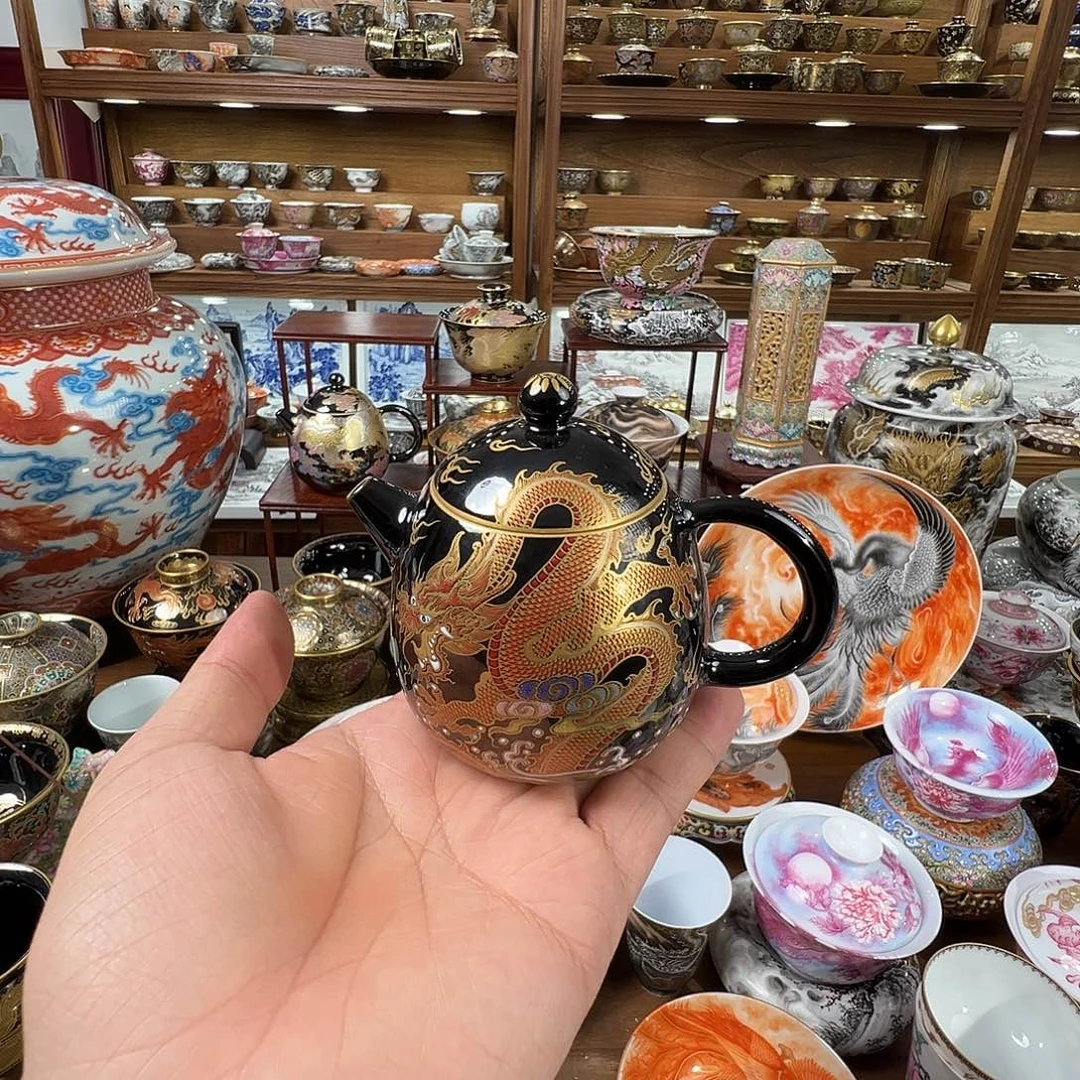 打***酒珐琅彩错金银龙蛋壶
