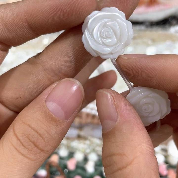 大理石磁石一颗20mm马蹄螺雕刻花