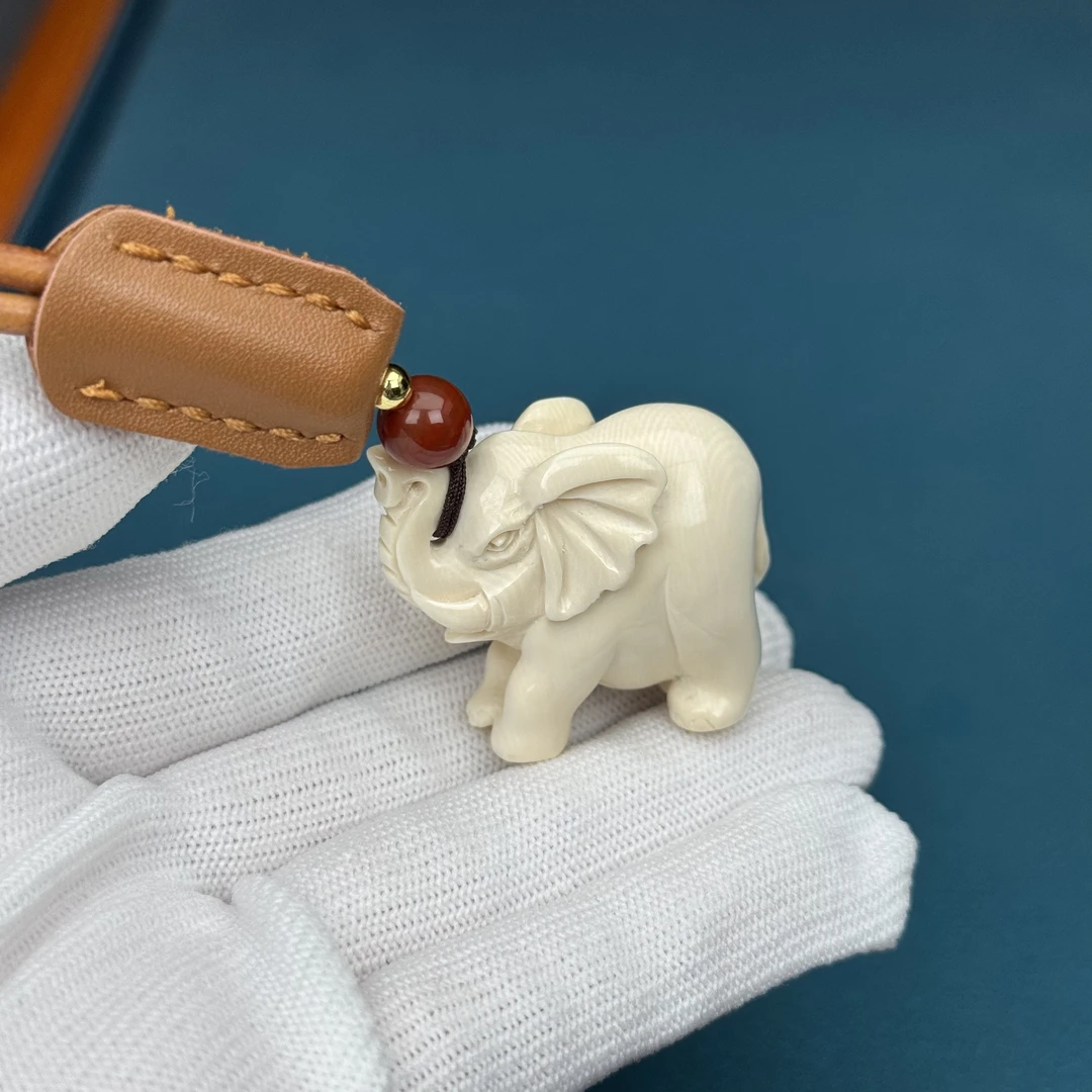 H3383天然猛犸牙 雕刻小象35*29*19mm支持鉴定 假一罚四