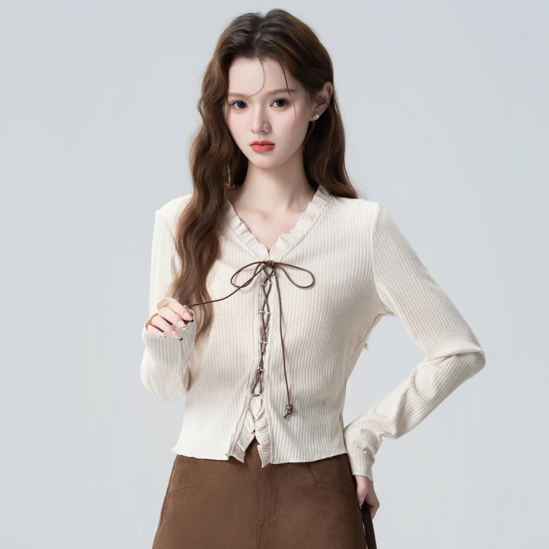 杏色V领长袖针织衫女春秋2025秋季新款设计感木耳边绑带短款上衣