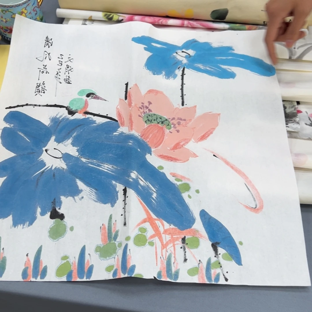 国画卖字画的小男孩