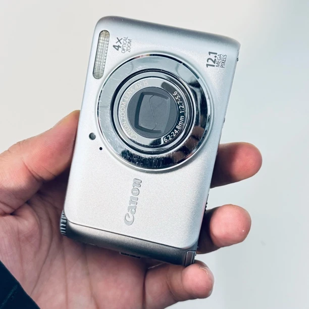 95新 Canon/佳能 a3100特价1210w像素16倍长焦人白景浓