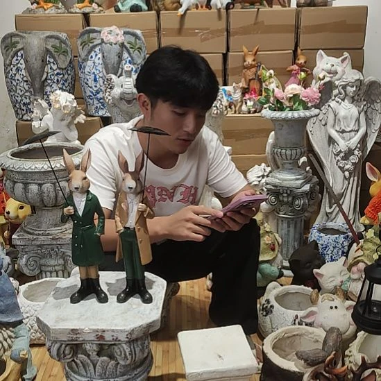 合成树脂打伞兔一对