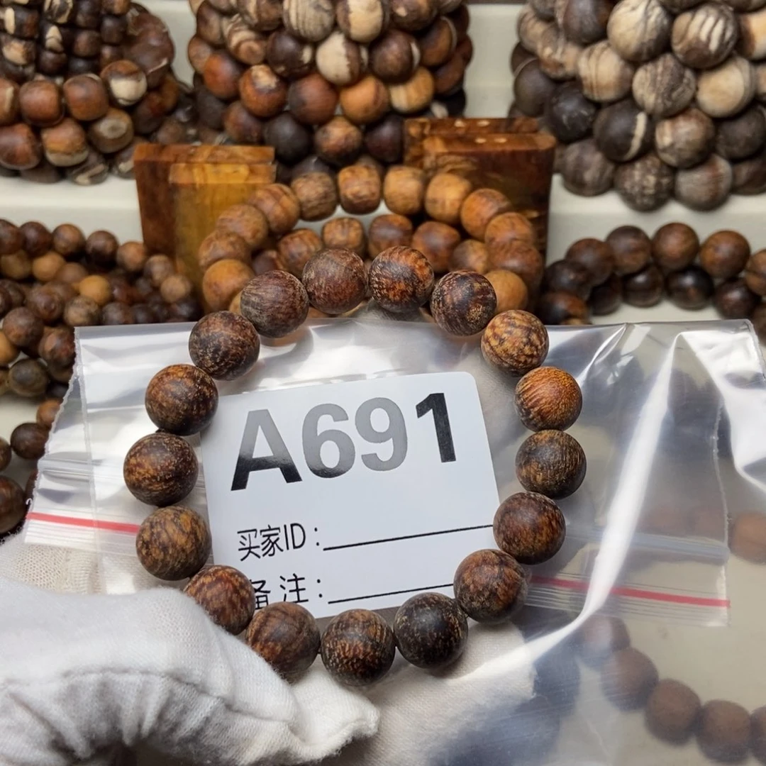 泽***泽贡木1.2龙鳞手串691