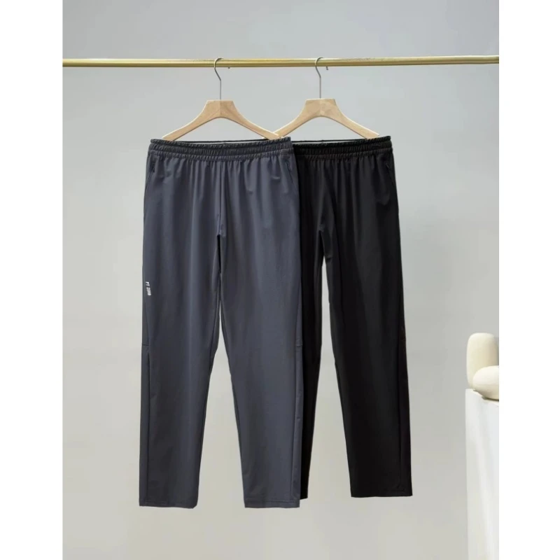 SC25448春季户外训练跑步防泼水透气弹力运动梭织长裤