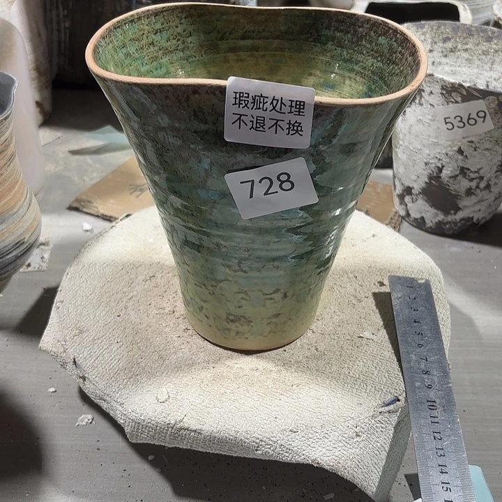 斐***.摆件陶728，有孔，瑕疵处理，