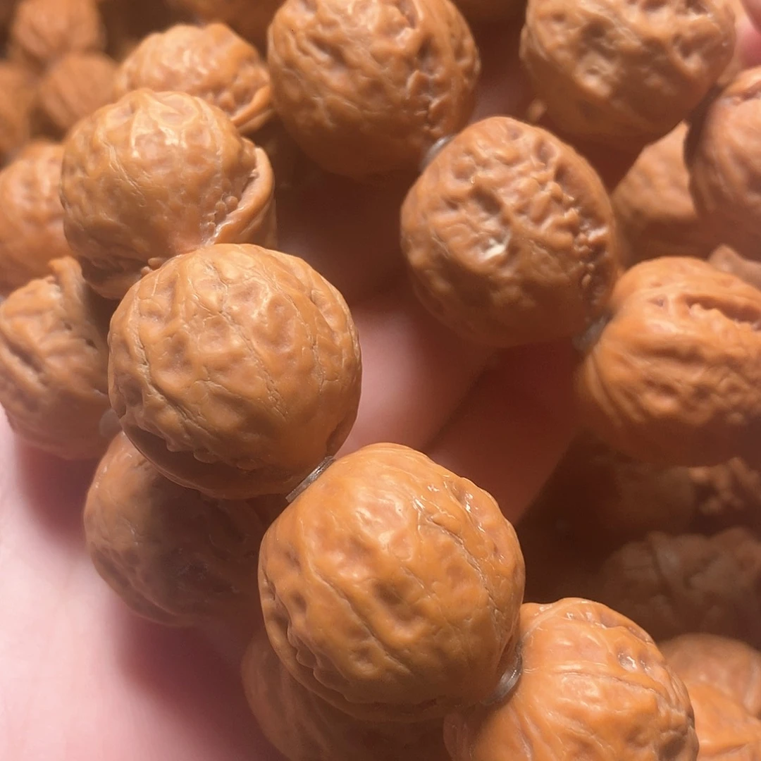 文玩核桃手串东*大光头