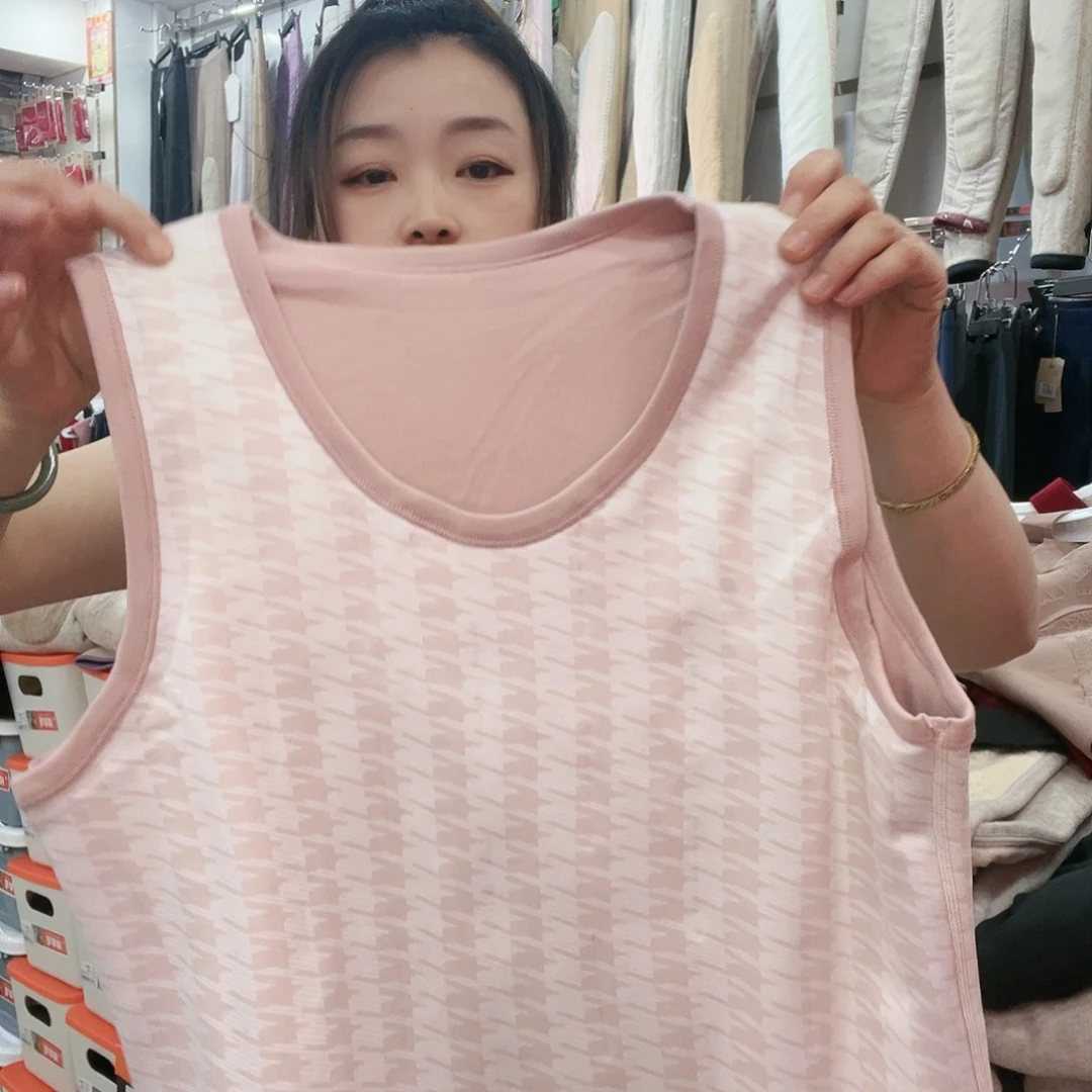 羊羔毛140-160斤女羊毛背心粉