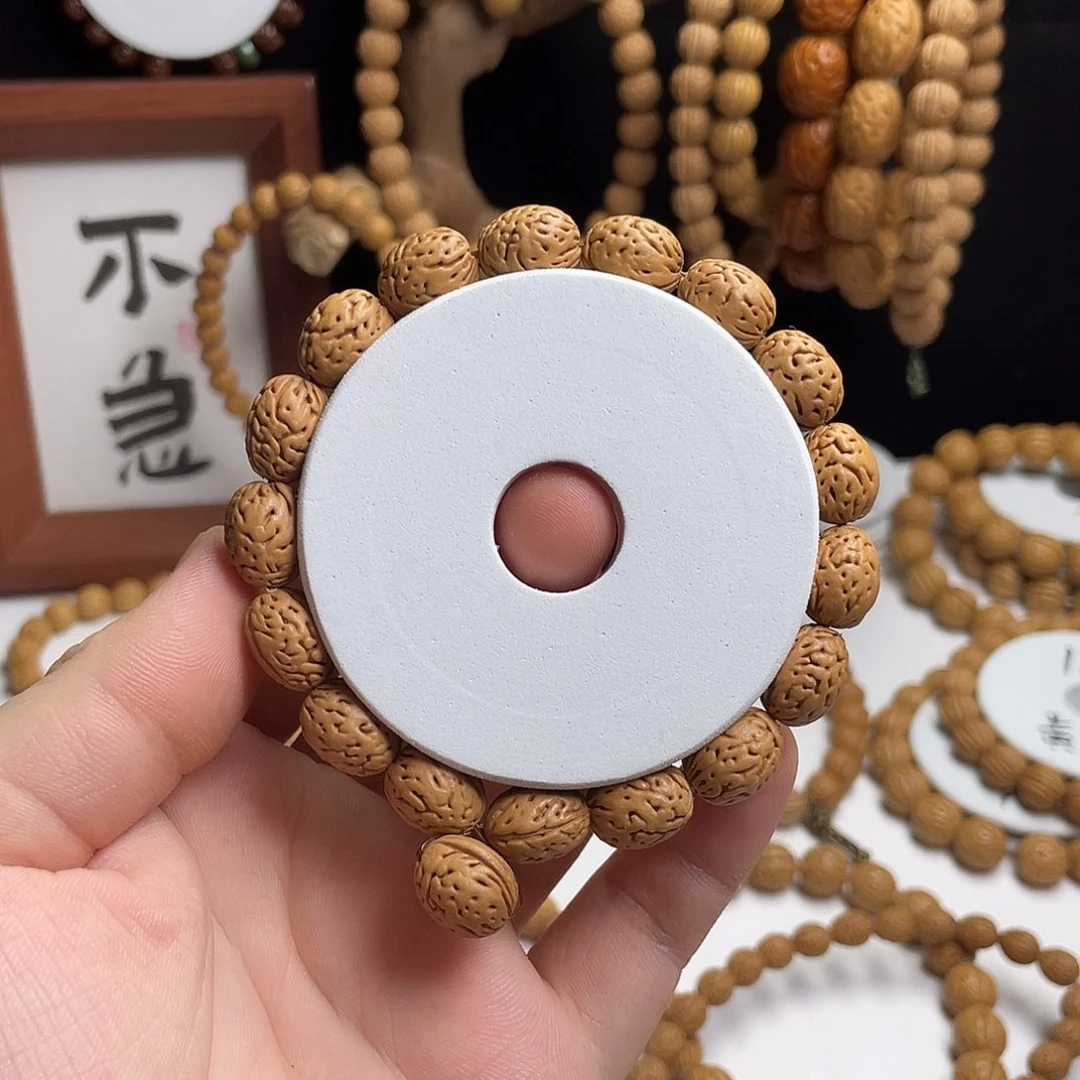 断***子手串桃核金瓜子野生钱袋子