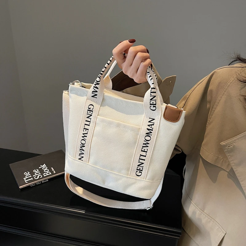 Gentle Woman小众百搭字母肩带水桶包包2025新款泰国帆布单肩包袋