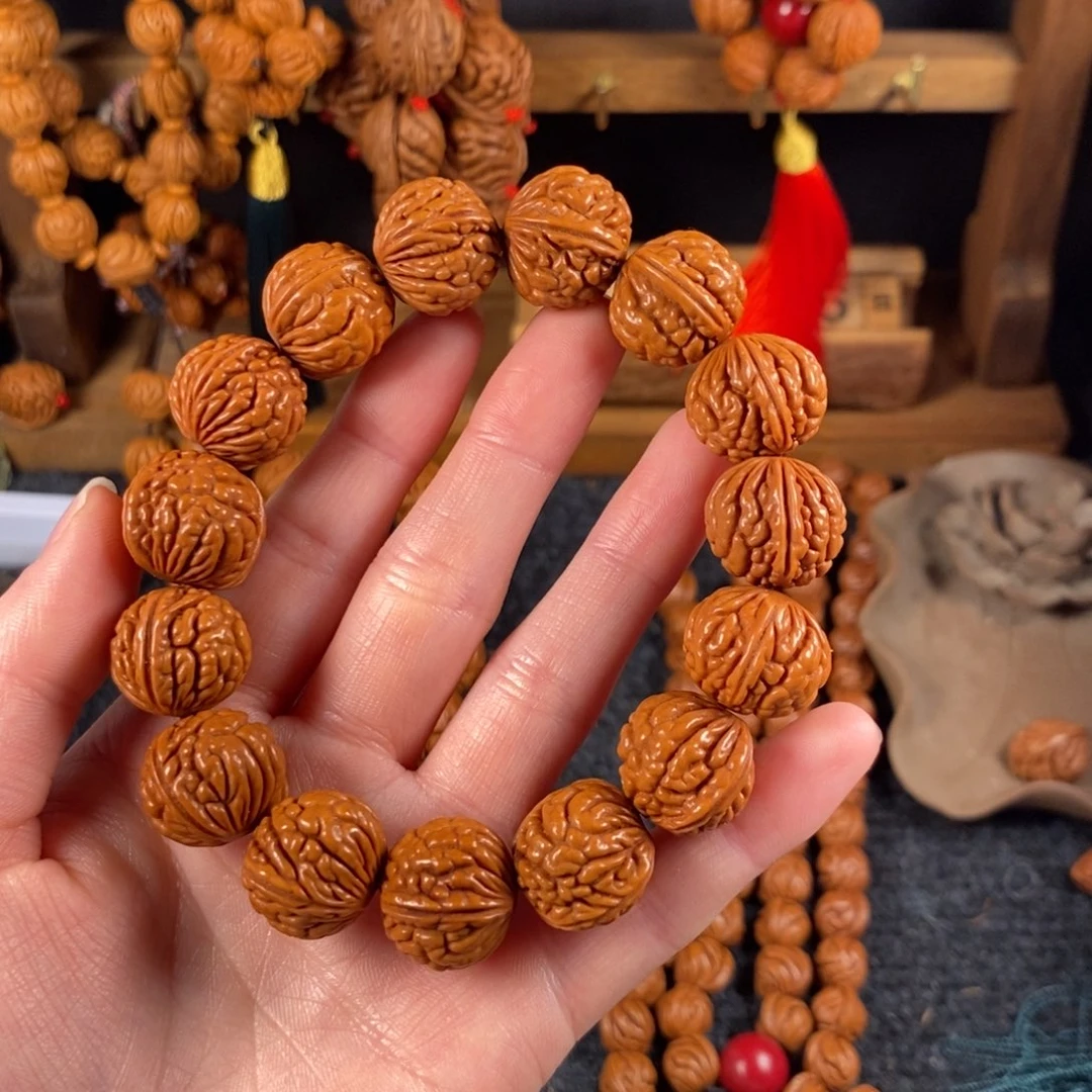 吊坠桃核桃枭手串