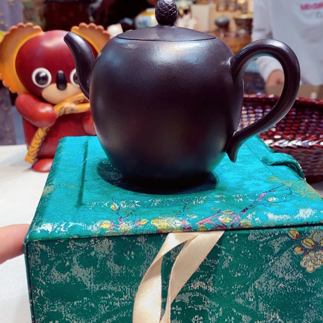善***迎如图所示 观兰器物
