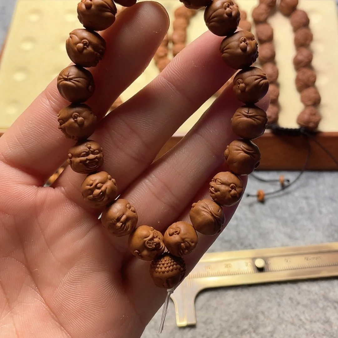 龙纹桃核雕刻百态